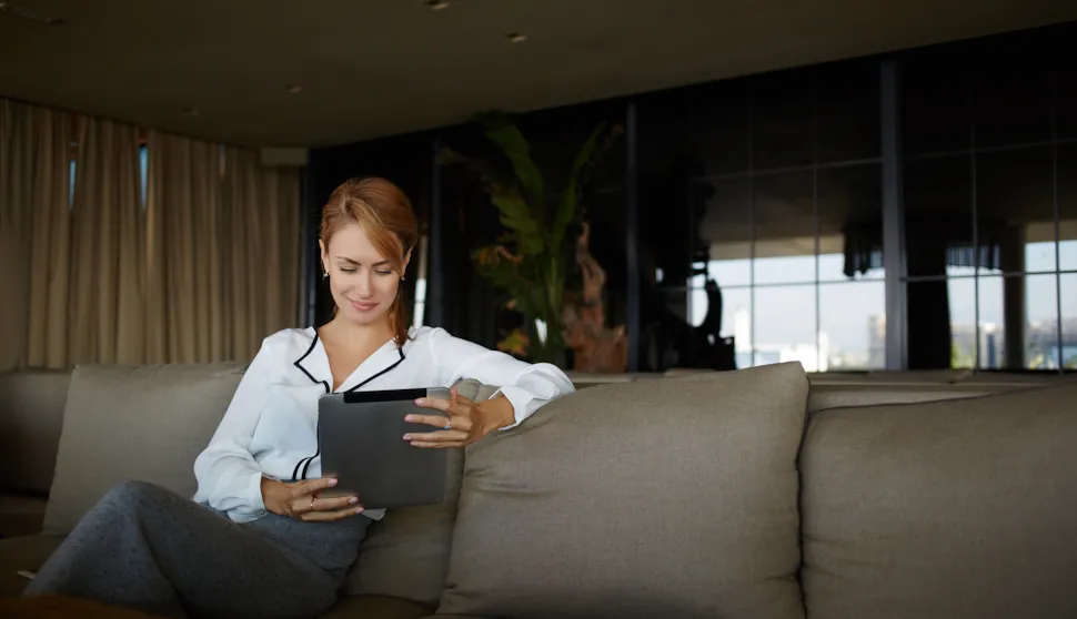 Business woman looking at tablet
