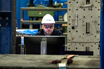 Lab engineer monitoring a test