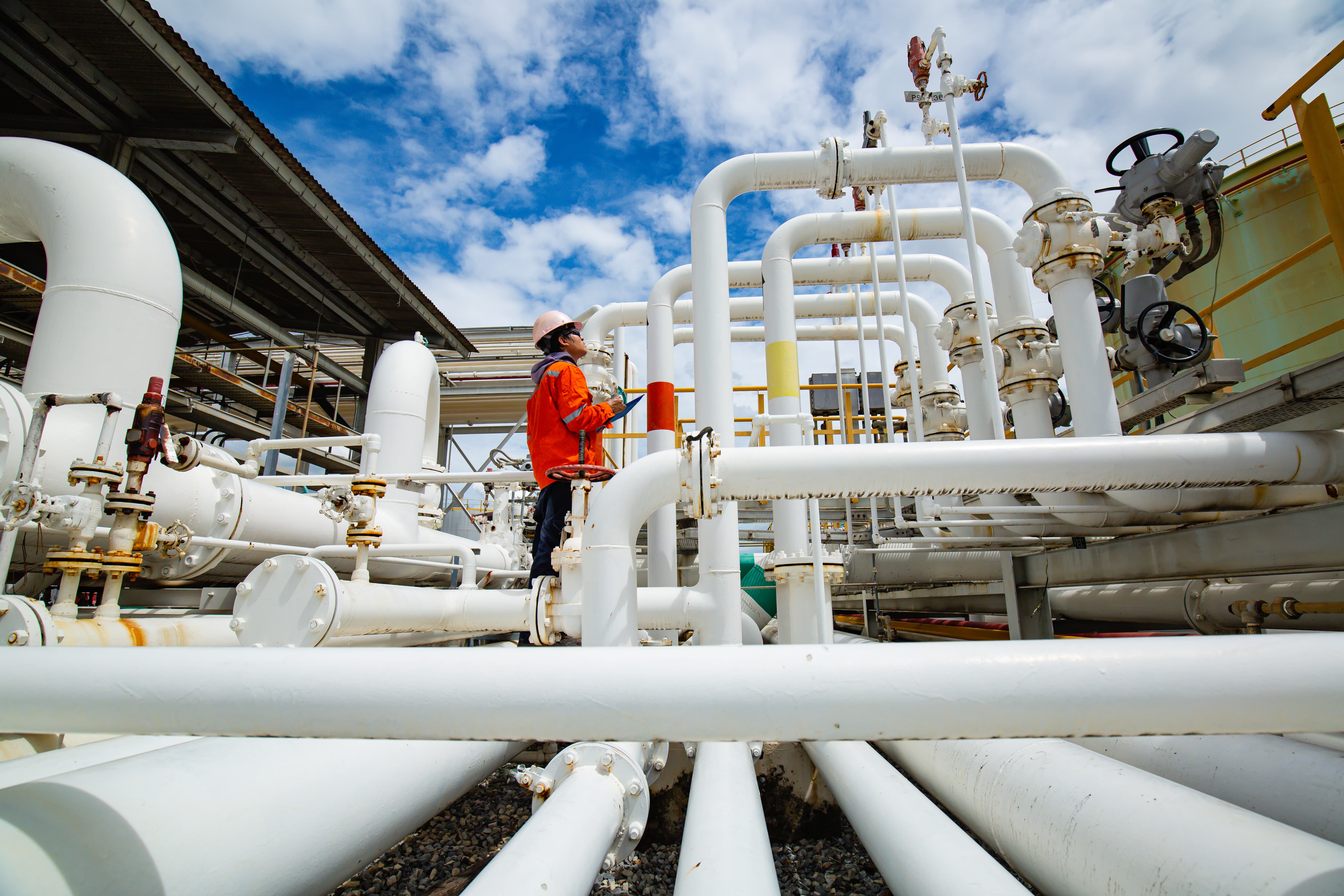 worker on pipeline facility