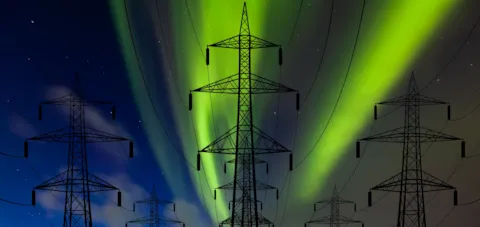 Power lines against the polar sky - Aurora borealis