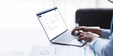 woman works on laptop